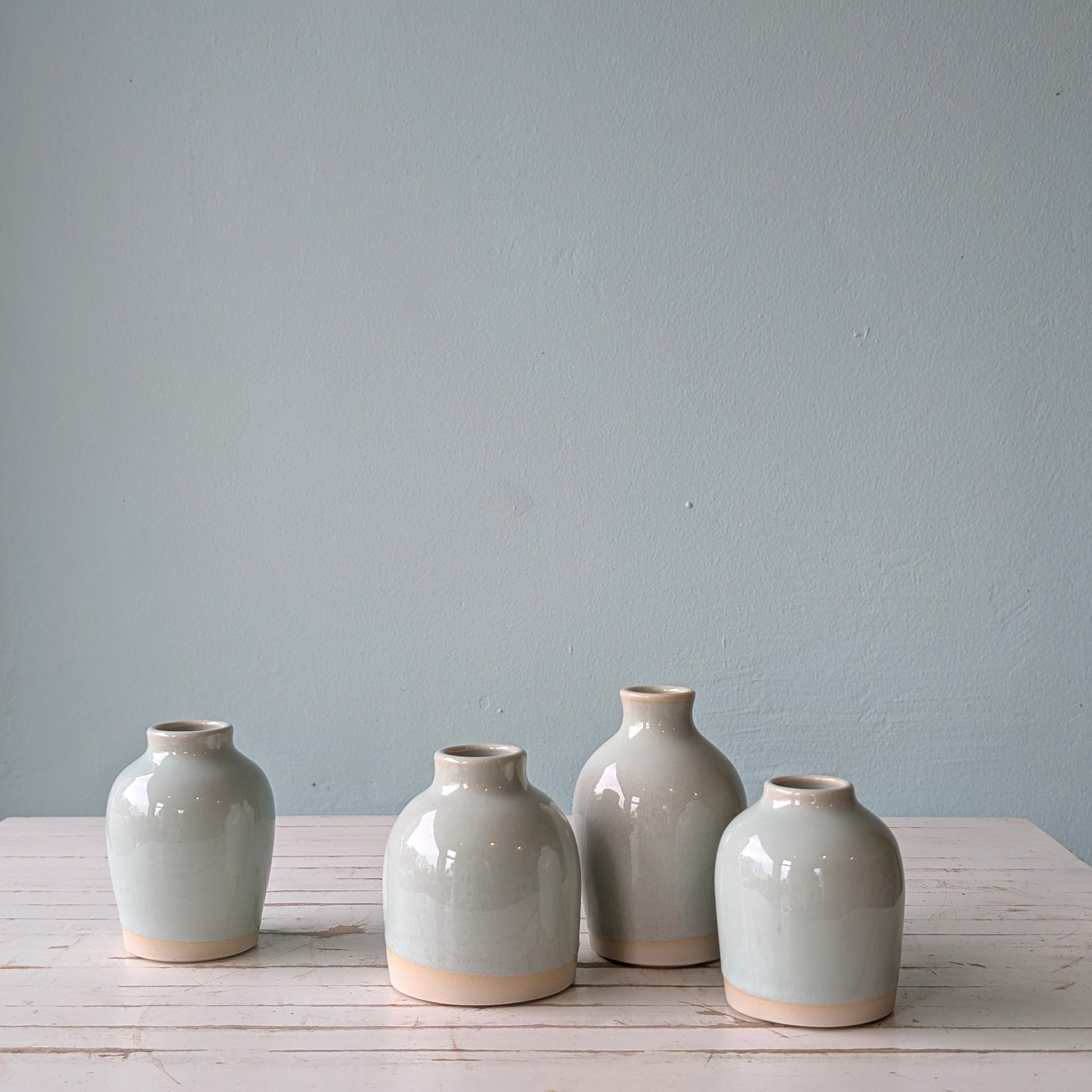 Collection of 4 pale blue gloss bud vases by Asahi So