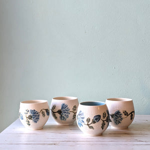Dariya Gratte carved porcelain wildflower bowl blue