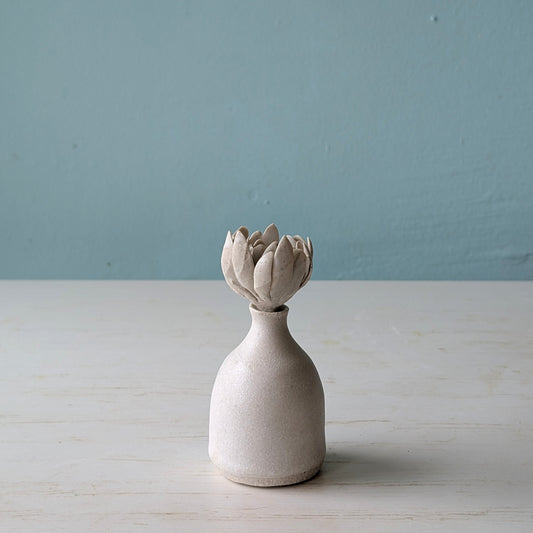 Small ceramic perfume bottle with succulent shaped lid