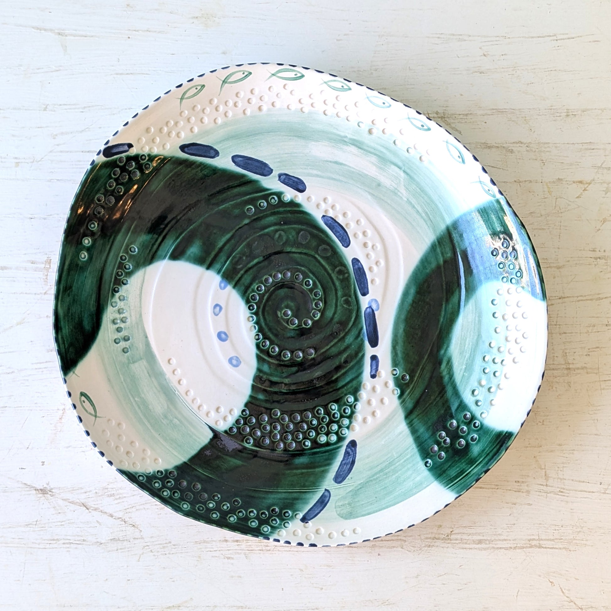 Ceramic platter with abstract green and blue design
