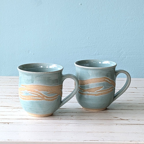 Therese McMahon 300ml mug sky blue